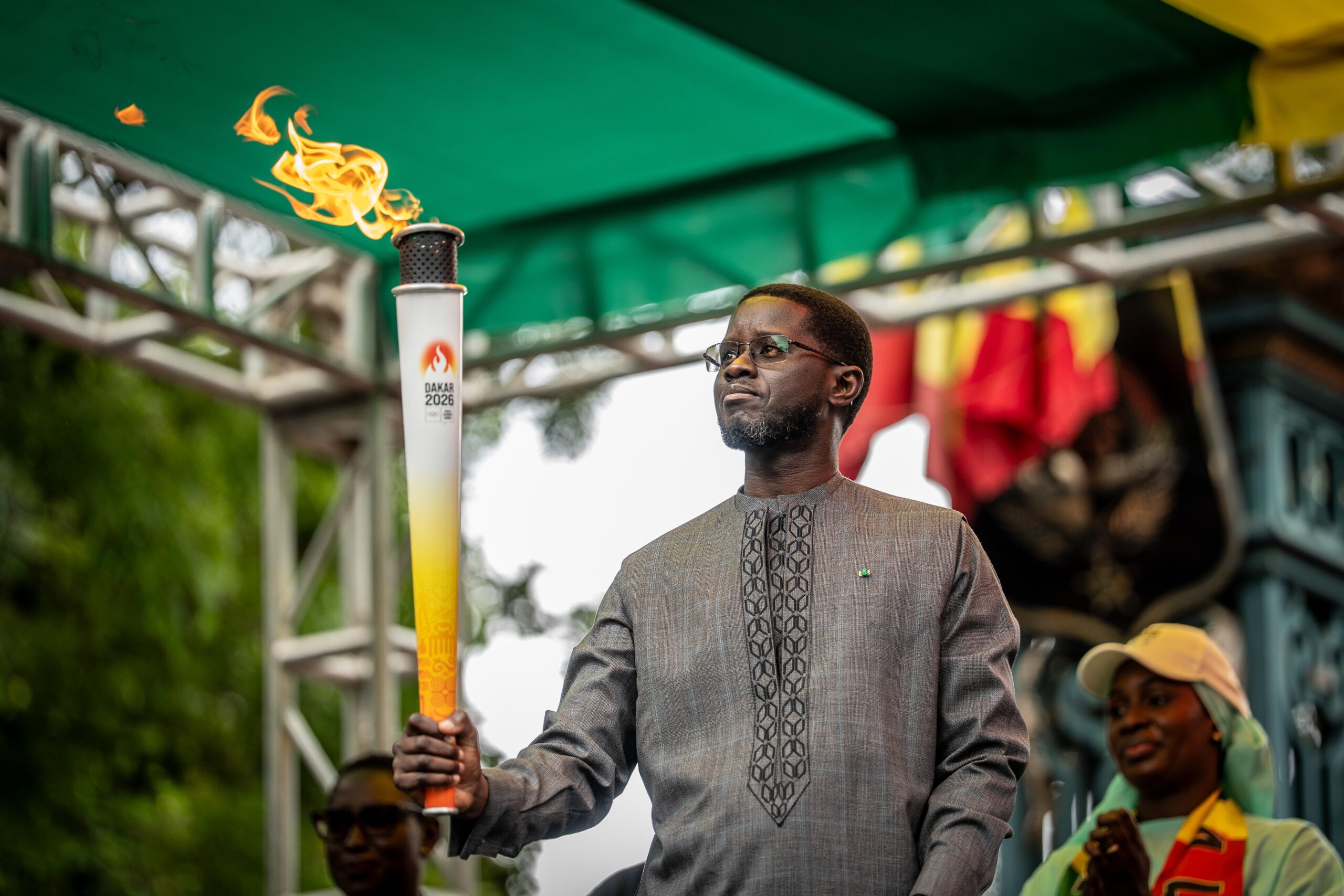 Senegal President, Bassirou Diomaye Faye, receives the Olympic flame in Dakar. Senegal President, Bassirou Diomaye Faye, receives the Olympic flame in Dakar.